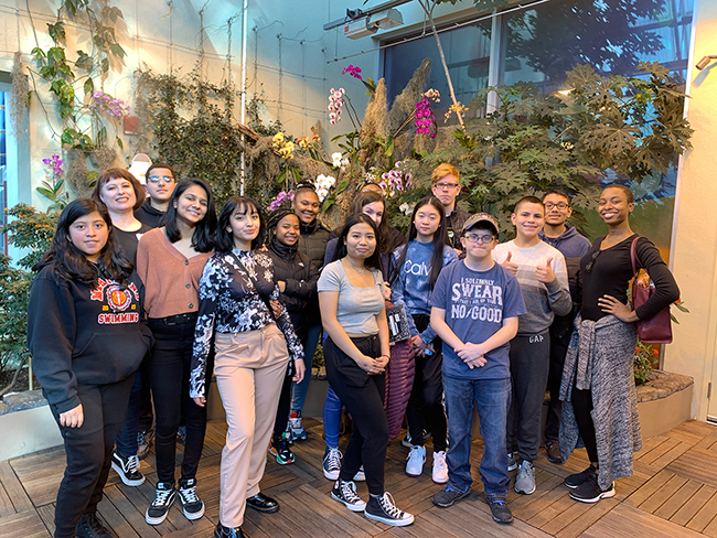 Andrea & EVOLUTIONS students in front of the butterfly exhibit at the CT Science Museum