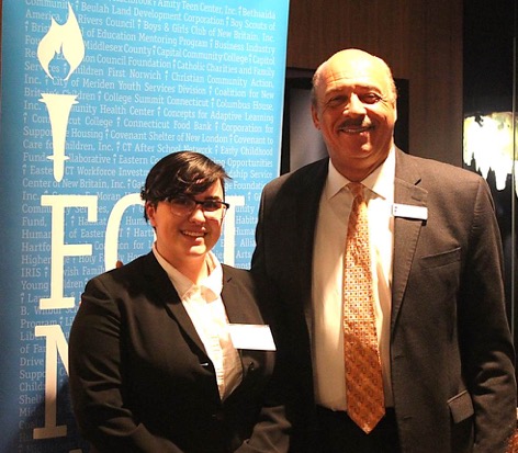 Liberty Bank President and CEO Chandler J. Howard presents a grant check to Alexcina Figueroa, EVO senior and Sci.CORPS member!