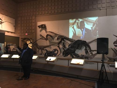 EVO student Wayde Whichard delivers another speech in the Great Hall of Dinosaurs.